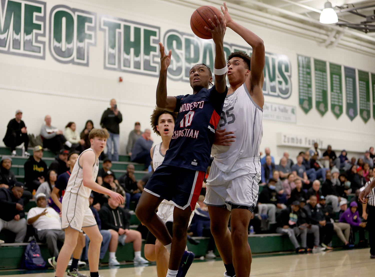 Caedin Hamilton (35) with a block from behind for St. Joseph in 2023. 